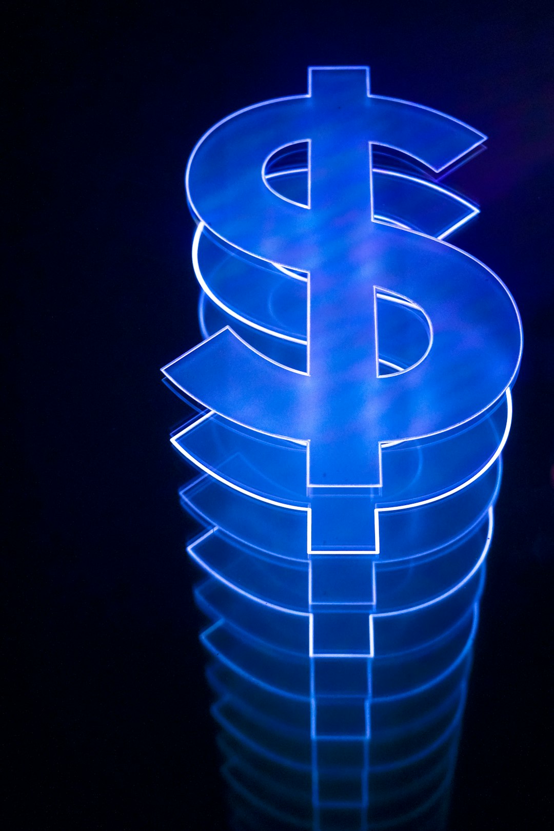 Illuminated dollar sign stacked.